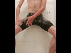 Speedo Boy gets horny in the bathroom