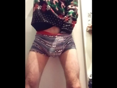 The guy jerks off and cums in the fitting room